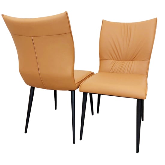 Photo of Ferndale tan faux leather dining chairs in pair