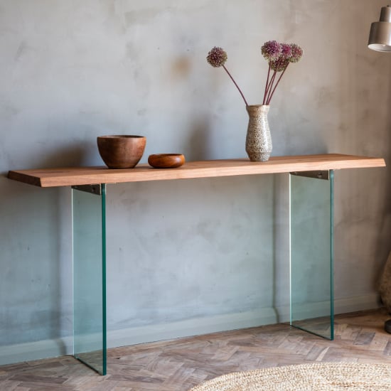 Read more about Ferno wooden console table with glass legs in natural