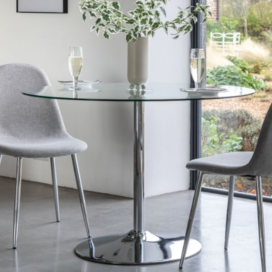 Product photograph of Field Round Clear Glass Dining Table With Chrome Base from Furniture in Fashion