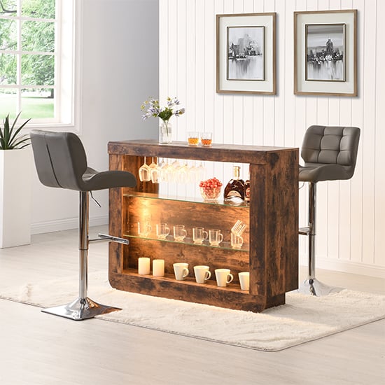 Photo of Fiesta smoked oak bar table unit with 2 candid grey stools