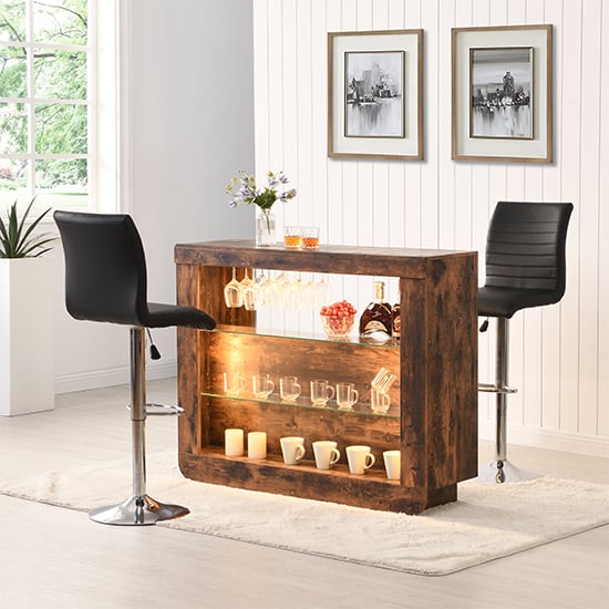 Photo of Fiesta smoked oak bar table unit with 2 ripple black stools