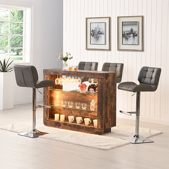 Photo of Fiesta smoked oak bar table unit with 4 candid grey stools