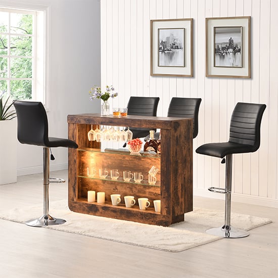Photo of Fiesta smoked oak bar table unit with 4 ripple black stools