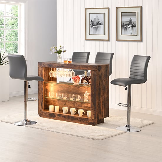 Photo of Fiesta smoked oak bar table unit with 4 ripple grey stools