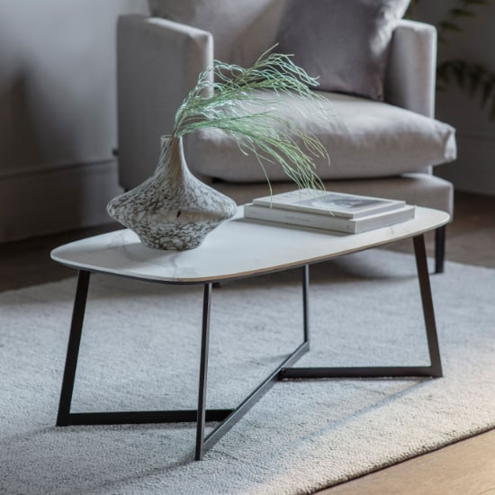 Read more about Finksburg wooden coffee table in white marble effect
