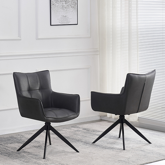 Read more about Flint dark grey faux leather dining chairs in pair