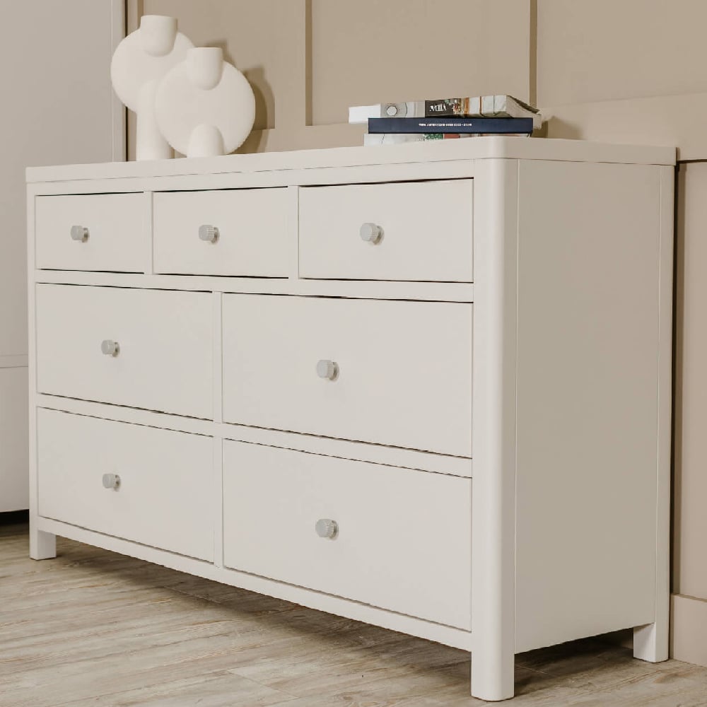 Read more about Folsom wooden chest of 7 drawers in natural