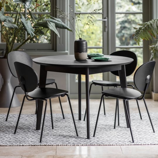 View Forden wooden round dining table in black