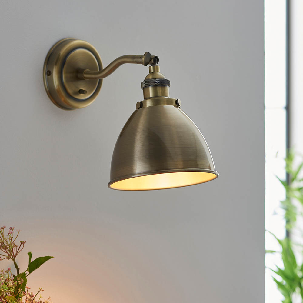Read more about Franklin rolled shade wall light in antique brass