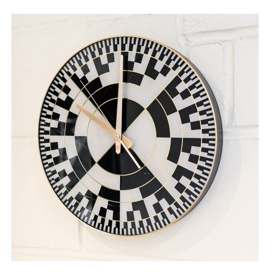 Read more about Frelick wall clock in black and white with checkers design