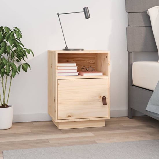Photo of Fruma pine wood bedside cabinet with 1 door in natural