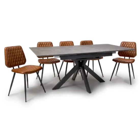 Photo of Gabri extending brown dining table with 8 allen tan chairs