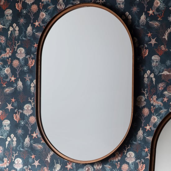 Read more about Garner elipse wall mirror in bronze