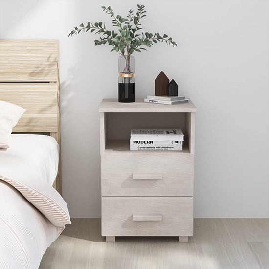 Photo of Garza solid pinewood bedside cabinet in white