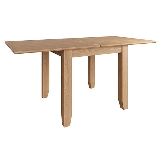 Photo of Gilford extending wooden flip top dining table in light oak