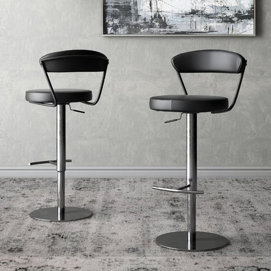 Read more about Glossop black leather bar stools with chrome base in pair