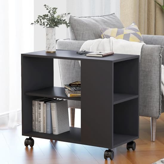 Read more about Gittel wooden side table with castors in grey