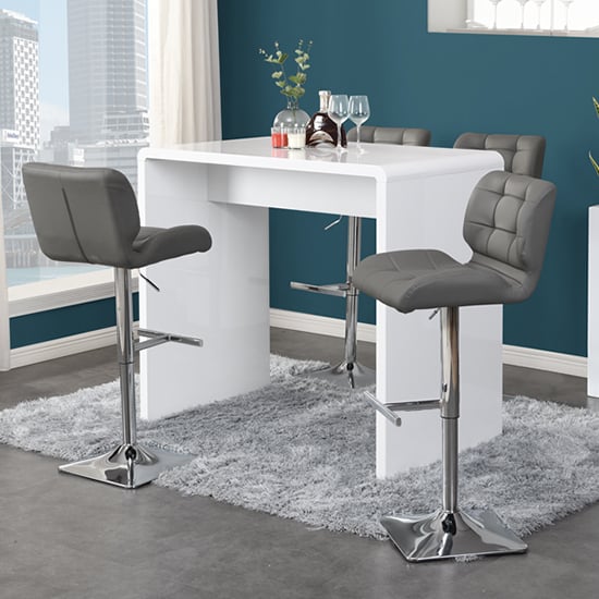 Photo of Glacier white high gloss bar table with 4 candid grey stools