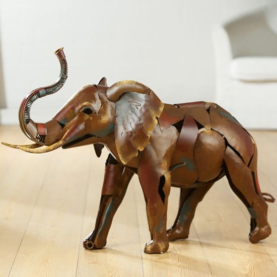 Read more about Glide savanna giant metal sculpture in antique brown