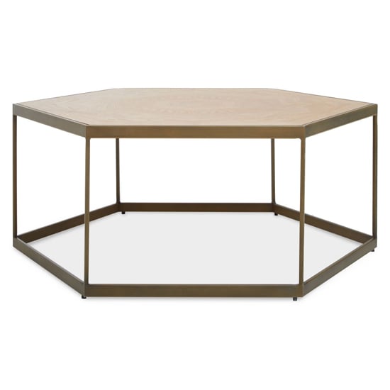Read more about Granule hexagonal wooden coffee table with brass frame in oak