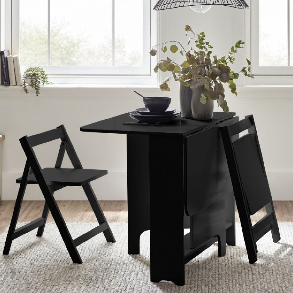 Read more about Gutersloh wooden gateleg dining table with 2 chairs in black