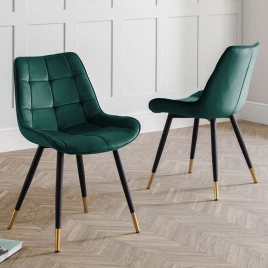 Read more about Hadas green velvet dining chairs with black metal legs in pair