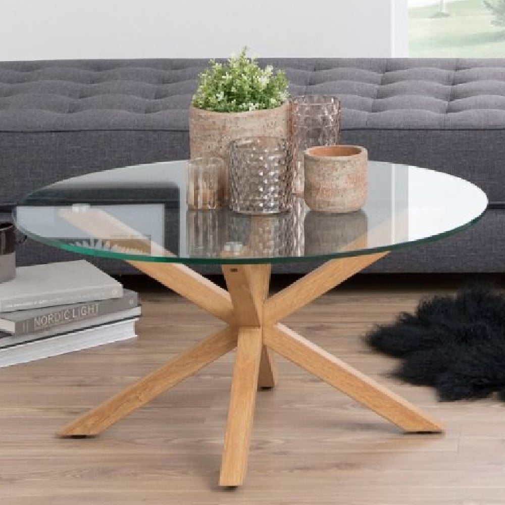 Read more about Haines glass coffee table round with oak legs in clear