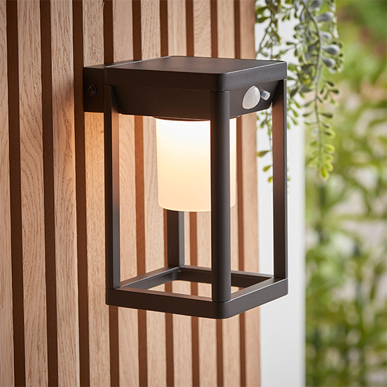 Product photograph of Hallam Led Pir Outdoor Wall Photocell In Textured Black from Furniture in Fashion