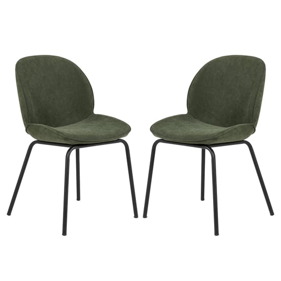 Clarisse green velvet dining chairs with oak legs in a Browse over