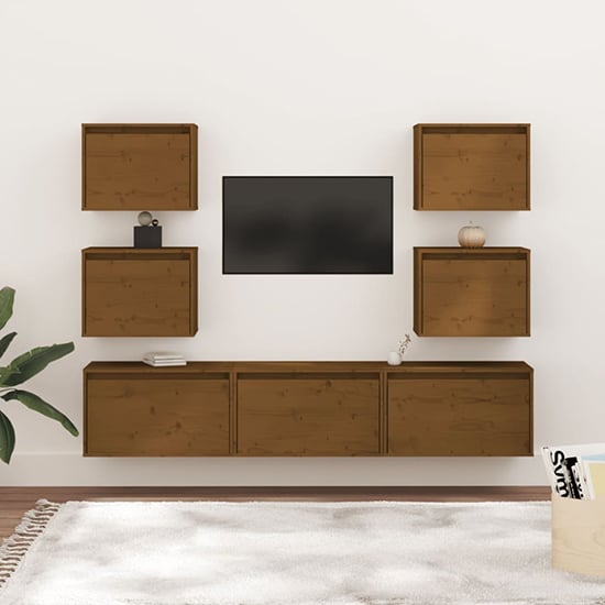 Photo of Harlan solid pinewood entertainment unit in honey brown