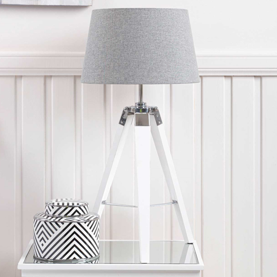 Photo of Harris grey linen drum shade table lamp with white tripod