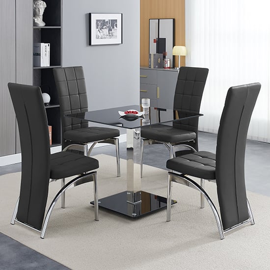 Product photograph of Hartley Black Glass Bistro Dining Table 4 Ravenna Black Chairs from Furniture in Fashion