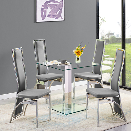 Photo of Hartley clear glass dining table with 4 chicago grey chairs