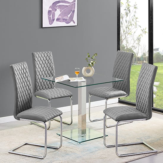 Photo of Hartley clear glass dining table with 4 ronn grey chairs