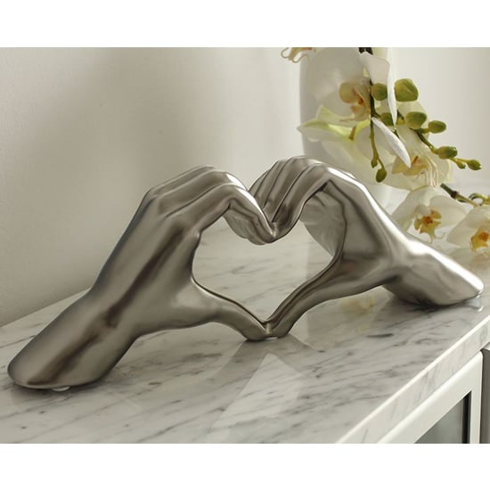 Photo of Heart ceramic hand sculpture in silver