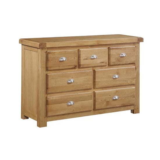 Photo of Heaton wooden chest of drawers in oak with 7 drawers