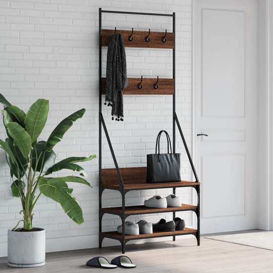 Read more about Hebron wooden clothes rack with shoe storage in brown oak