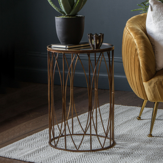 Product photograph of Hellidon Round Antique Glass Side Table In Bronze from Furniture in Fashion