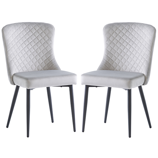 Photo of Helmi silver velvet dining chairs with black legs in pair