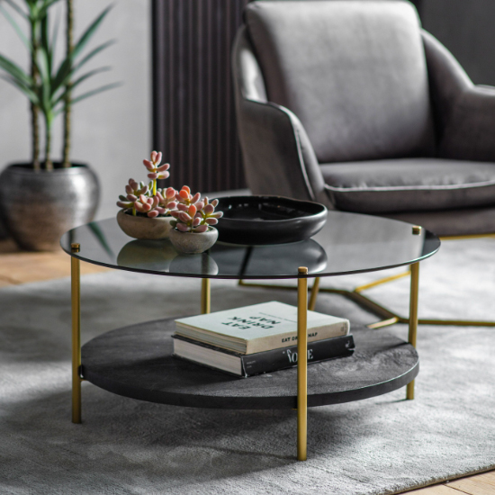 Product photograph of Hernan Round Black Glass Coffee Table With Gold Metal Legs from Furniture in Fashion