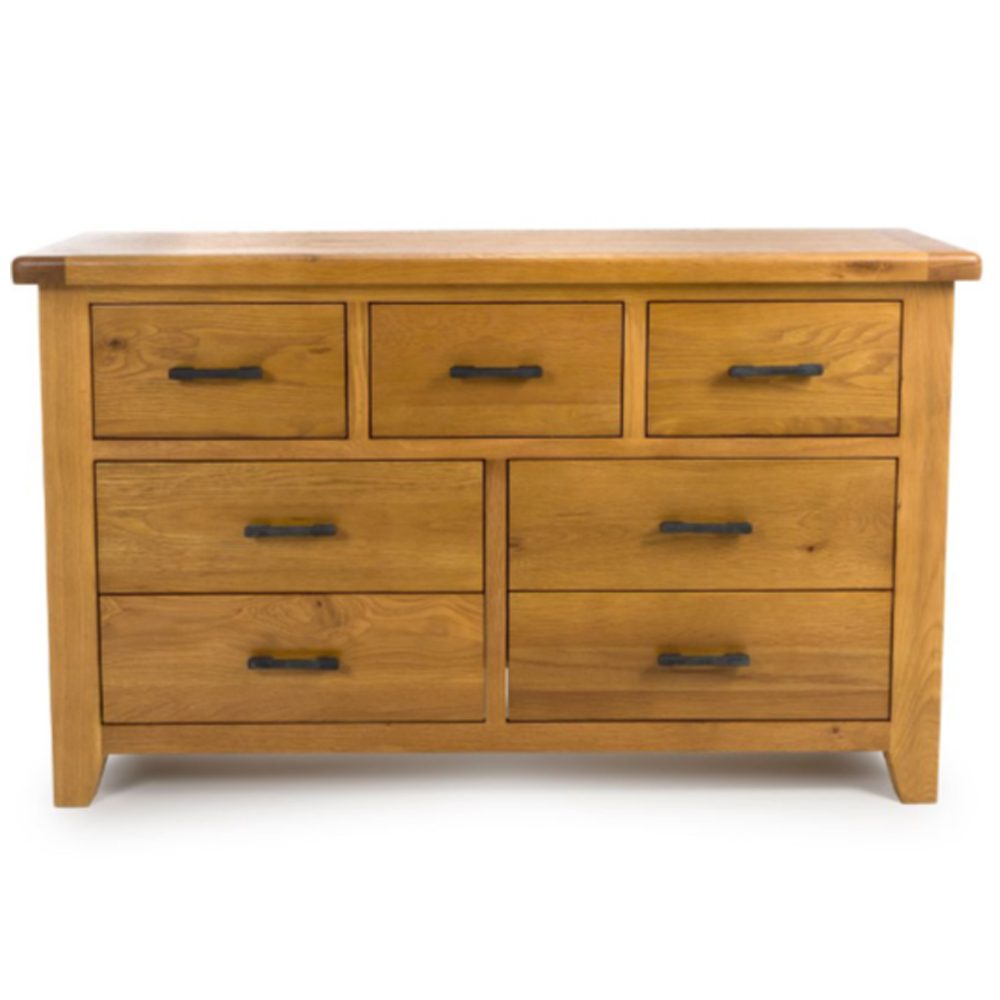 Hewitt Wide Wooden Chest Of 7 Drawers In Rustic Oak
