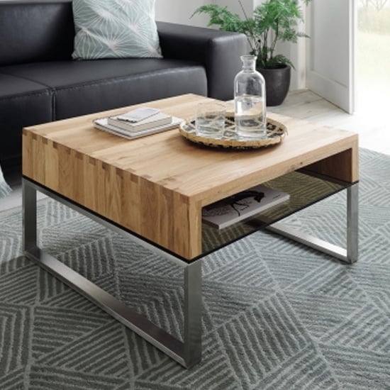 Read more about Hilary wooden coffee table in knotty oak with glass shelf