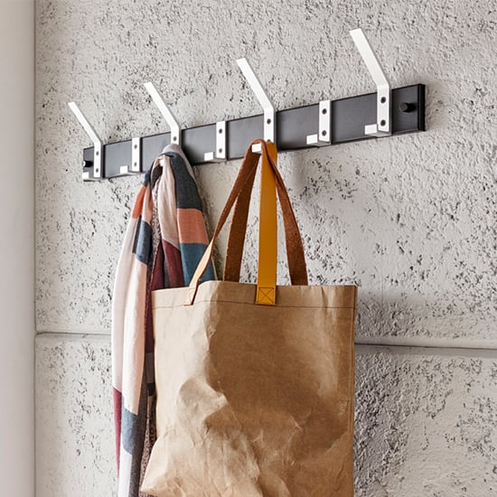 Product photograph of Hillsboro Wall Hung Metal 7 Hooks Coat Rack In Black from Furniture in Fashion