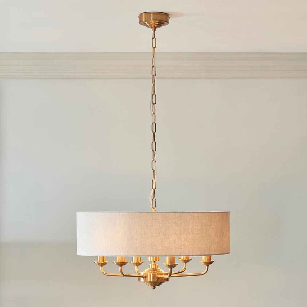 Read more about Hixson 6 light natural fabric pendant ceiling light in brass