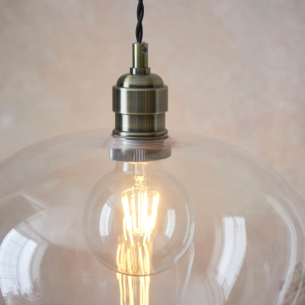 Hixson Medium Clear Glass Pendant Ceiling Light In Antique Brass