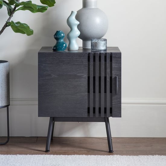 Photo of Holien wooden side table with 1 door in black