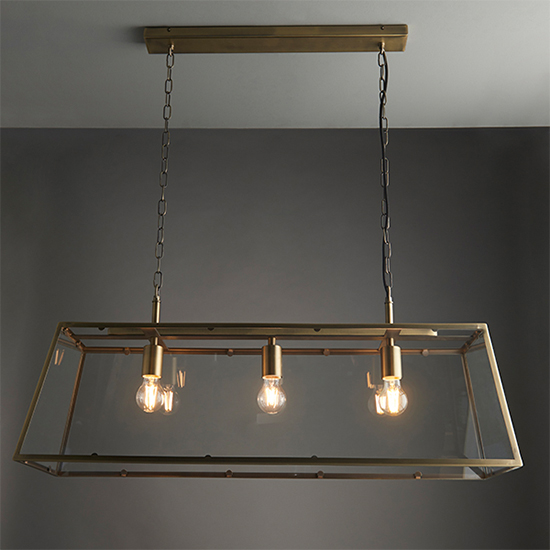 Photo of Hurst 3 lights clear glass pendant light in matt antique brass