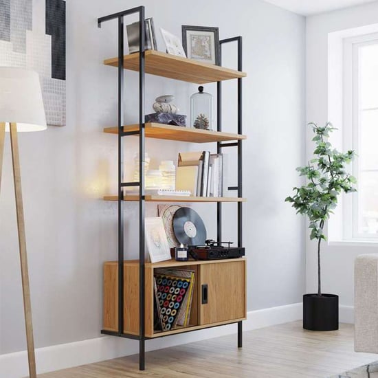 Read more about Helotes wooden bookcase with sliding door in serene walnut