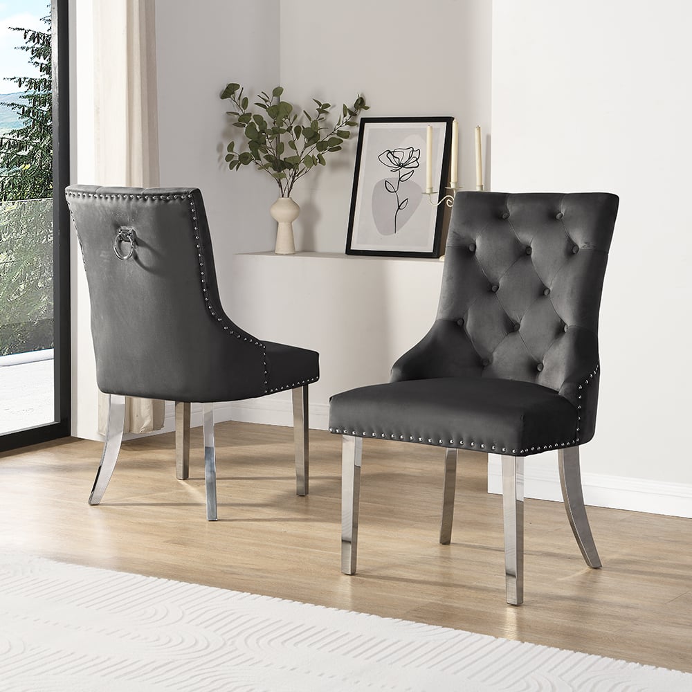 Read more about Imperial black velvet button back dining chairs in pair