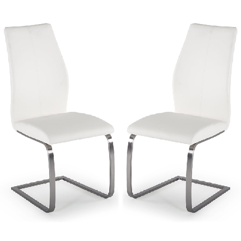 Read more about Ithaca white faux leather dining chairs with chrome base in pair